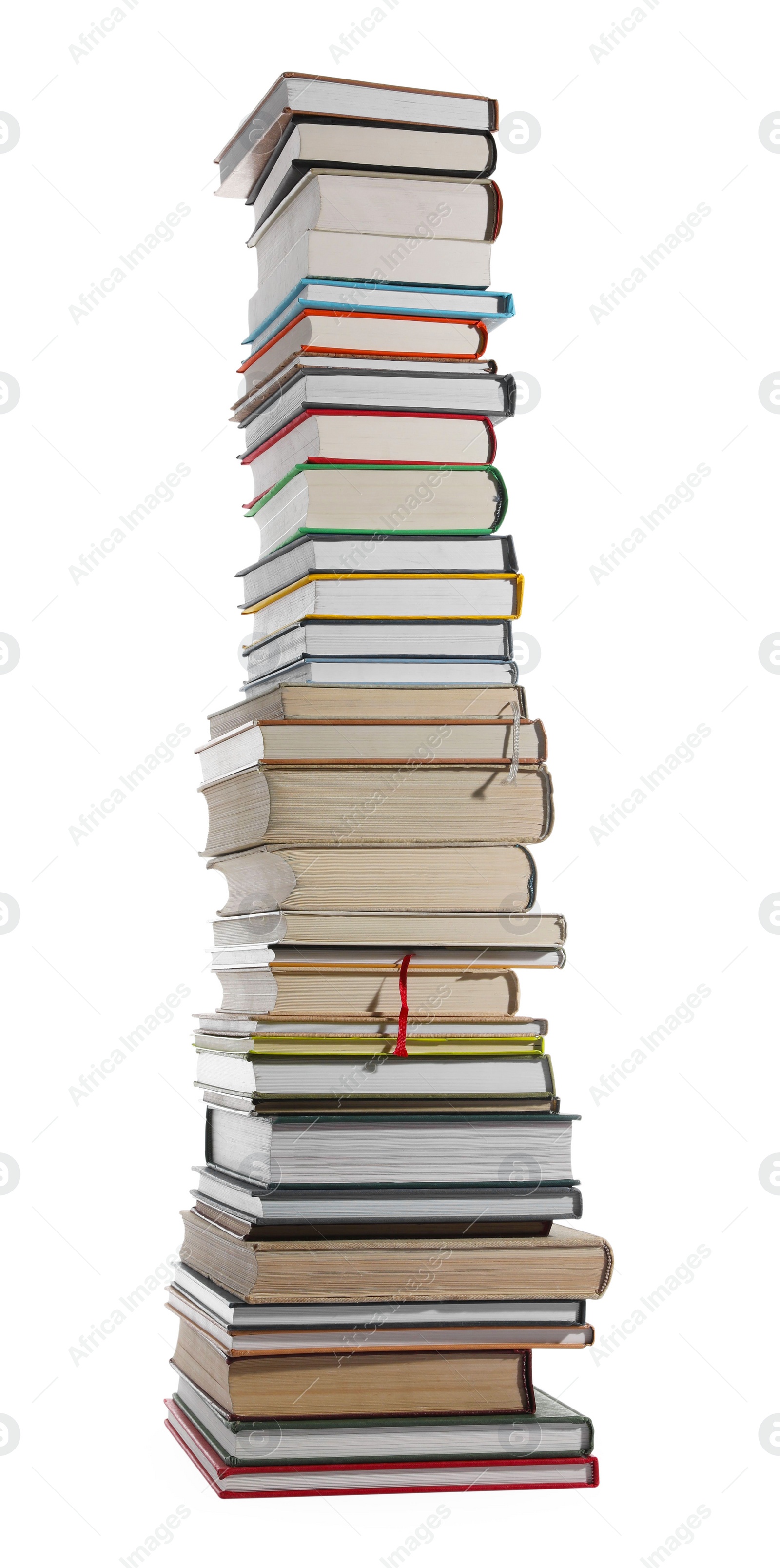 Photo of High stack of many different books isolated on white