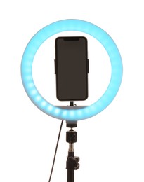 Photo of Tripod with ring light and smartphone isolated on white