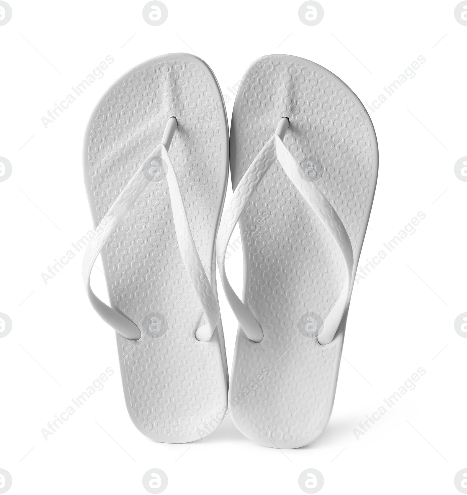 Photo of Stylish pair of flip flops on white background. Beach accessory