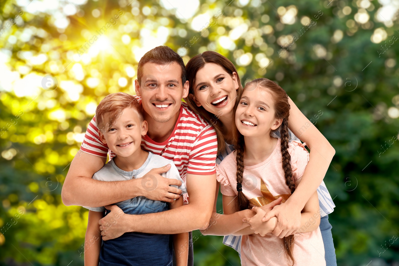 Image of Happy family with children outdoors on sunny day