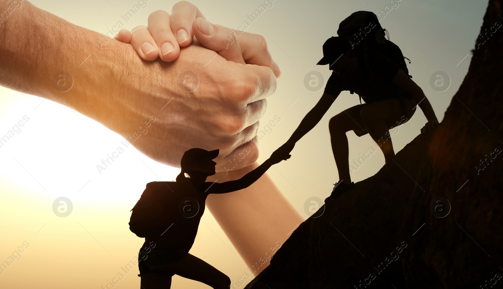 Image of Double exposure of people climbing up mountain and helping hand