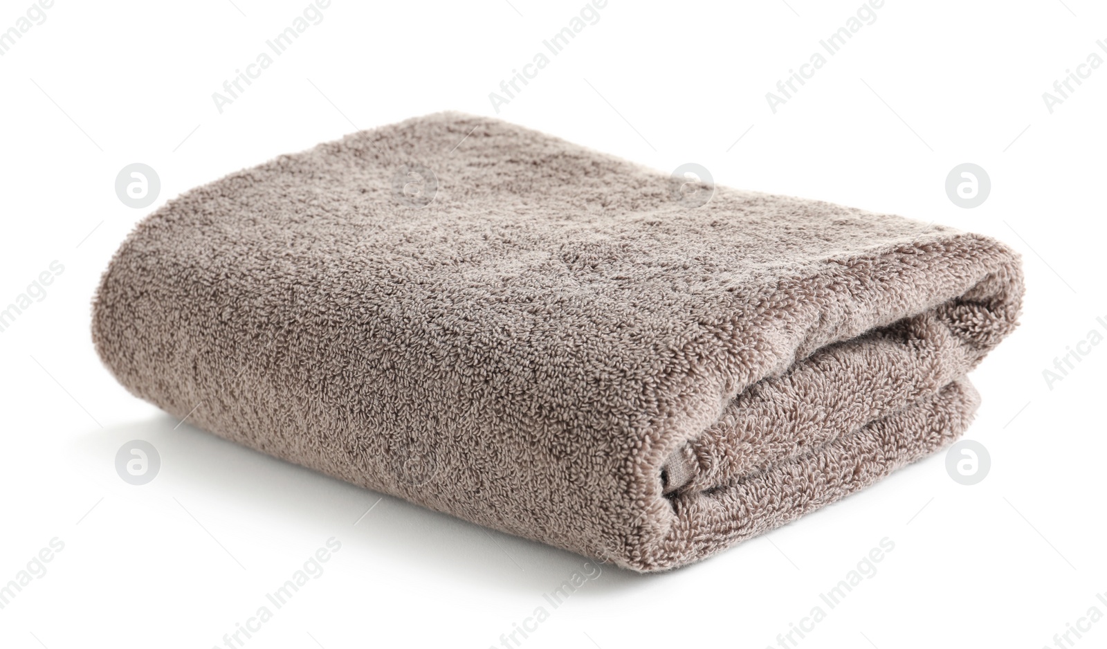 Photo of Fresh soft folded towel isolated on white