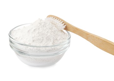 Photo of Glass bowl of tooth powder and brush on white background