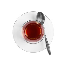 Photo of Glass of traditional Turkish tea with spoon isolated on white, top view