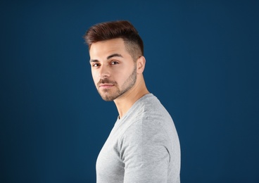 Portrait of handsome man on color background. Space for text