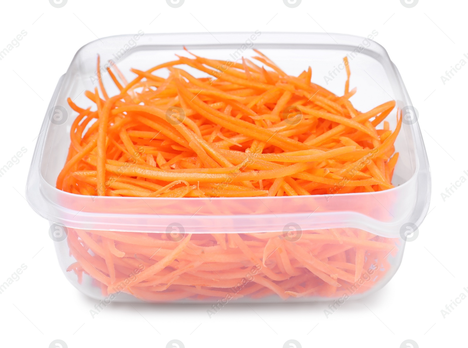 Photo of Fresh shredded carrots in plastic container isolated on white