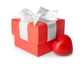 Photo of Beautiful gift box and red heart on white background. Valentine's day celebration
