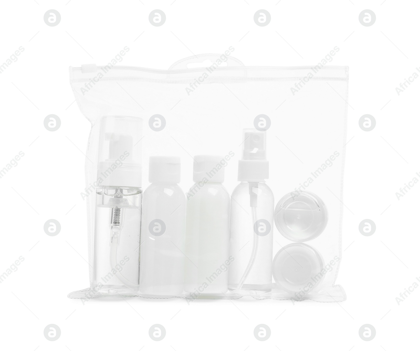 Photo of Cosmetic travel kit in plastic bag isolated on white. Bath accessories