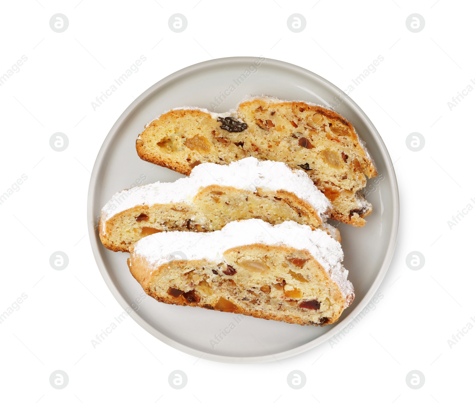 Photo of Traditional Christmas Stollen with icing sugar on white background, top view