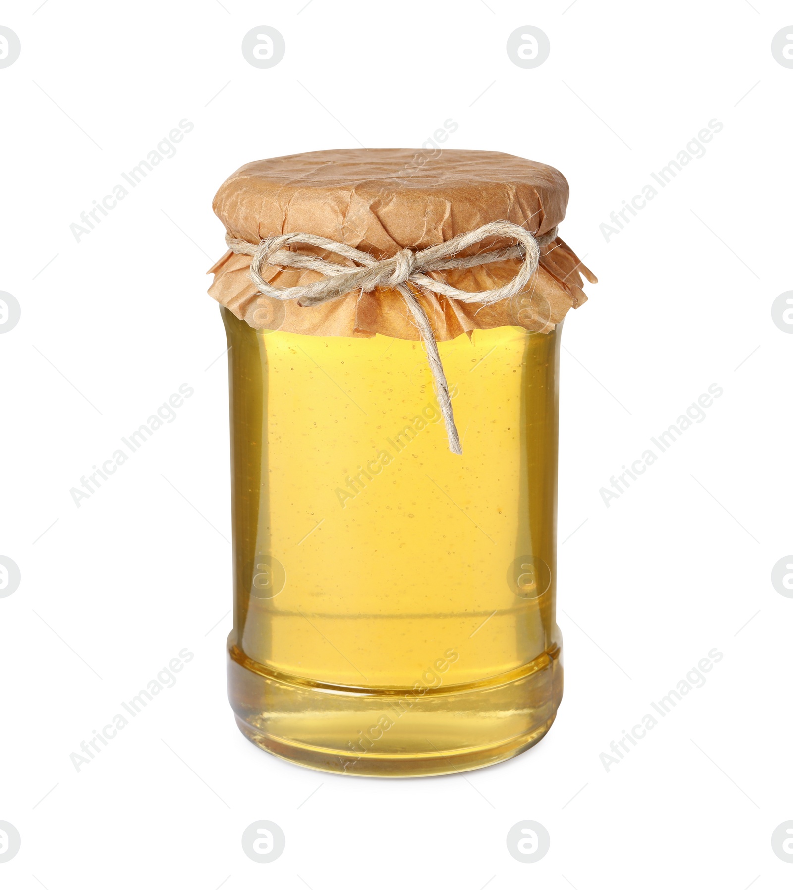 Photo of Tasty honey in glass jar isolated on white