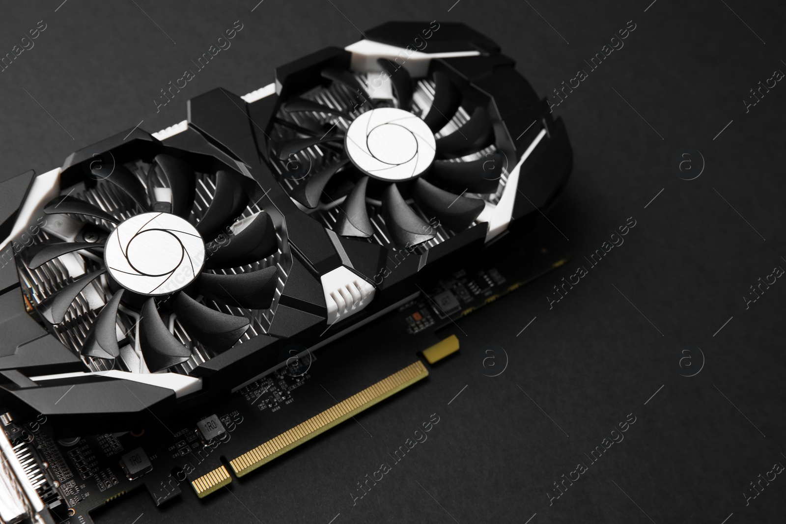 Photo of Computer graphics card on black background, closeup