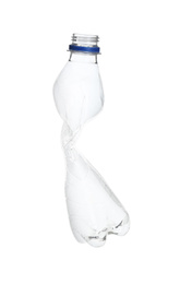 Photo of Empty crumpled bottle isolated on white. Plastic recycling