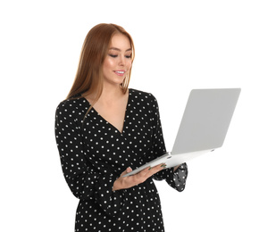 Teenage girl using laptop on white background