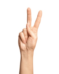 Photo of Woman showing number two on white background, closeup. Sign language