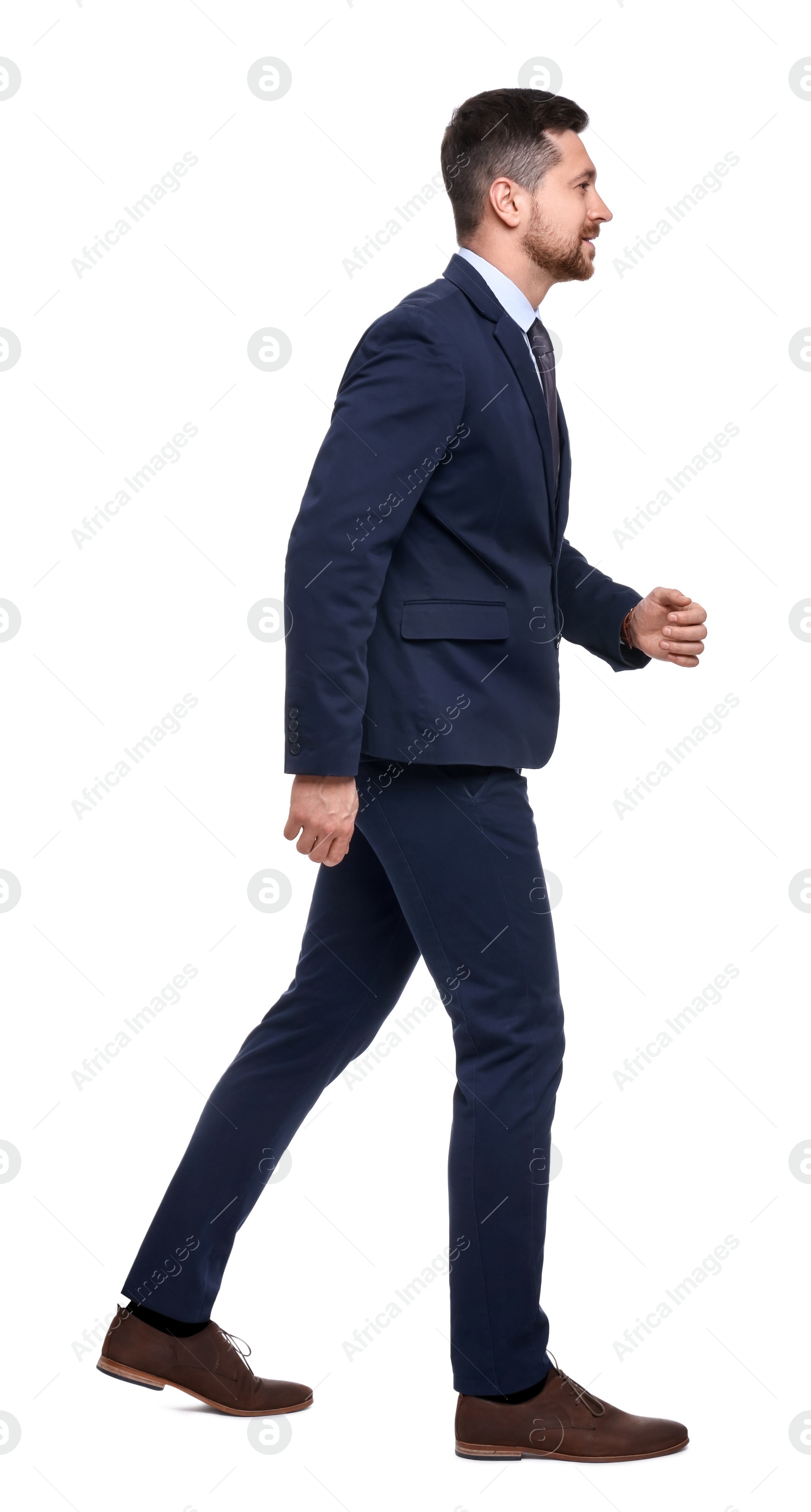 Photo of Handsome bearded businessman in suit on white background