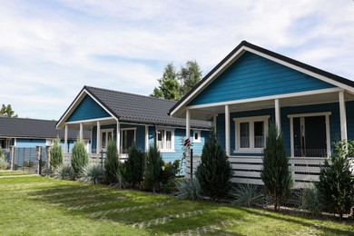 Exterior of beautiful modern blue houses outdoors