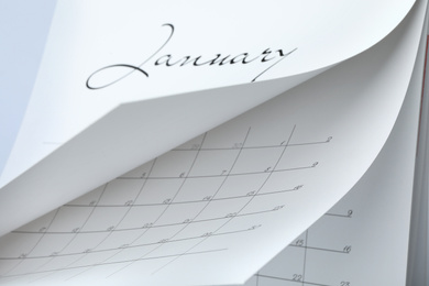 Photo of Closeup view of white paper office calendar