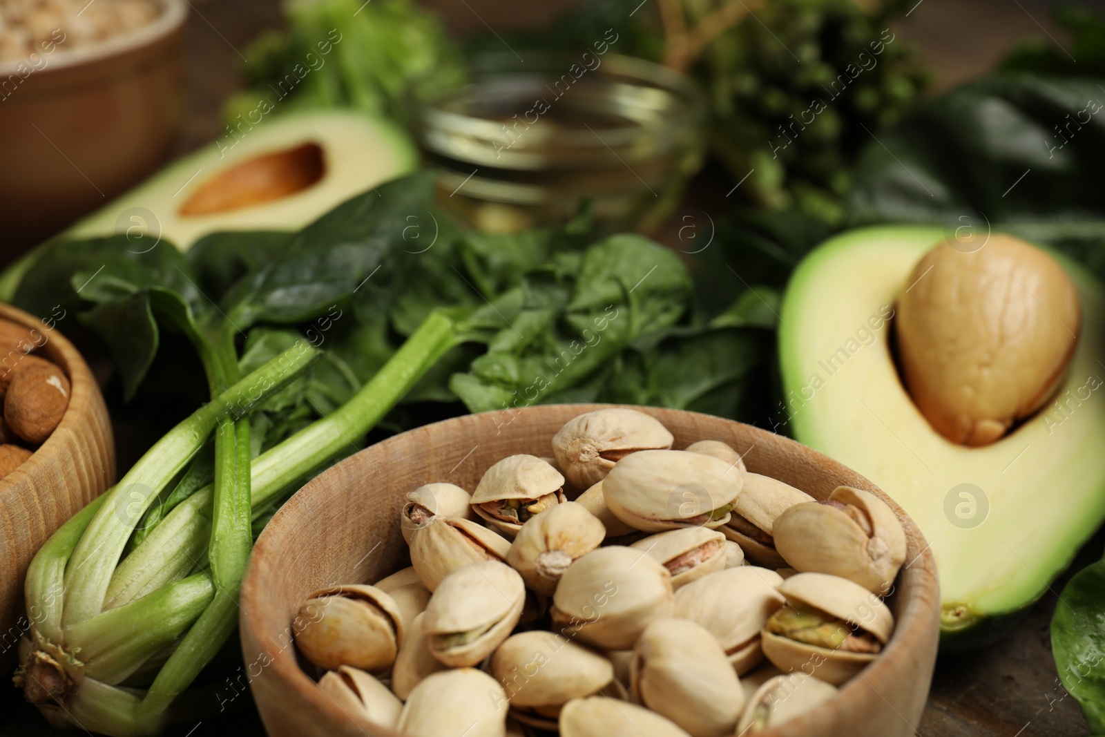 Photo of Different products rich in vitamin E on table, closeup