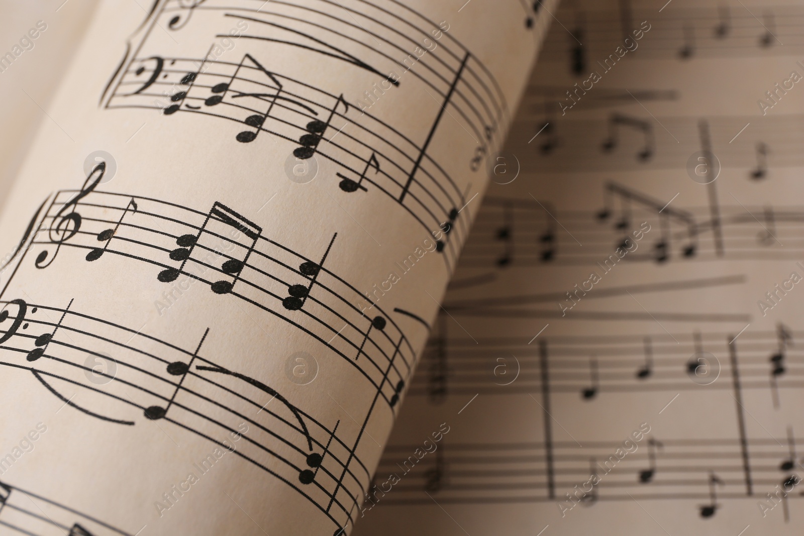 Photo of Closeup view of sheets with music notes
