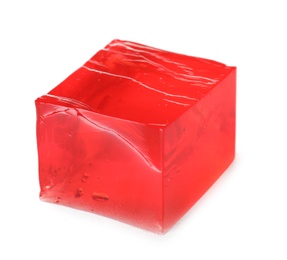 Photo of Delicious red jelly cube on white background