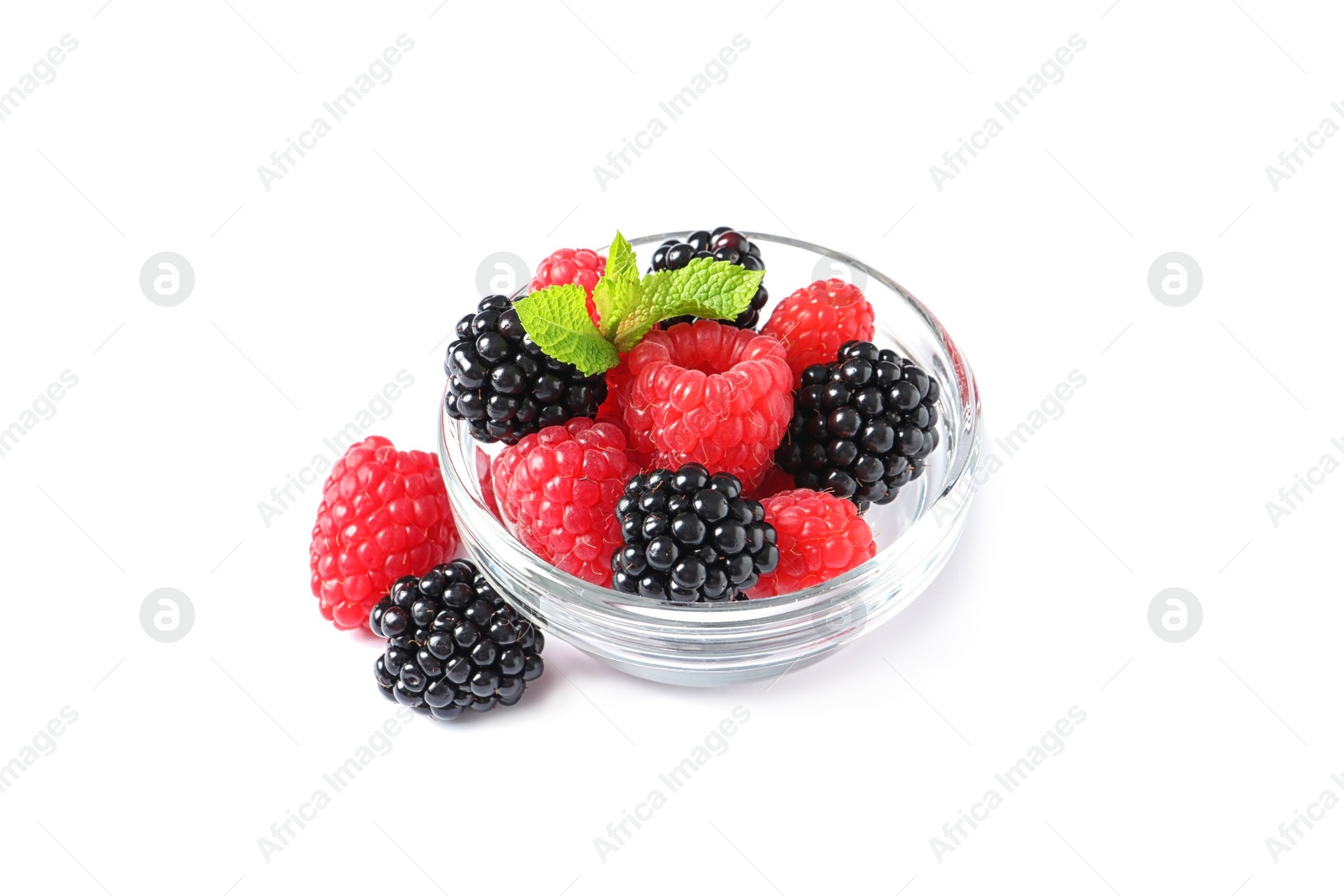 Photo of Bowl with raspberries and blackberries on white background