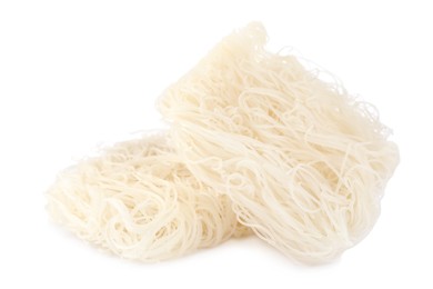 Photo of Bricks of dried rice noodles isolated on white. East Asian cuisine