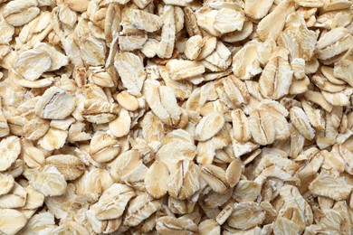 Photo of Pile of oatmeal as background, top view