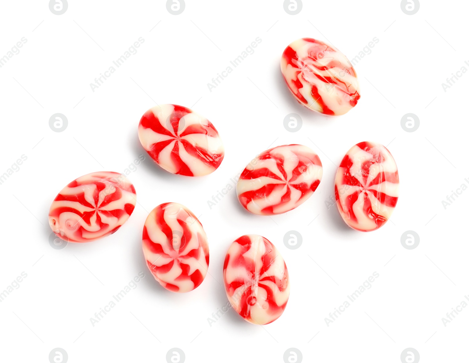 Photo of Delicious colorful candies on white background, top view