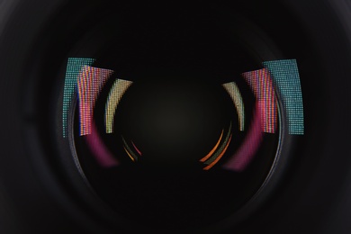 Photo of Camera lens of professional photographer, closeup view