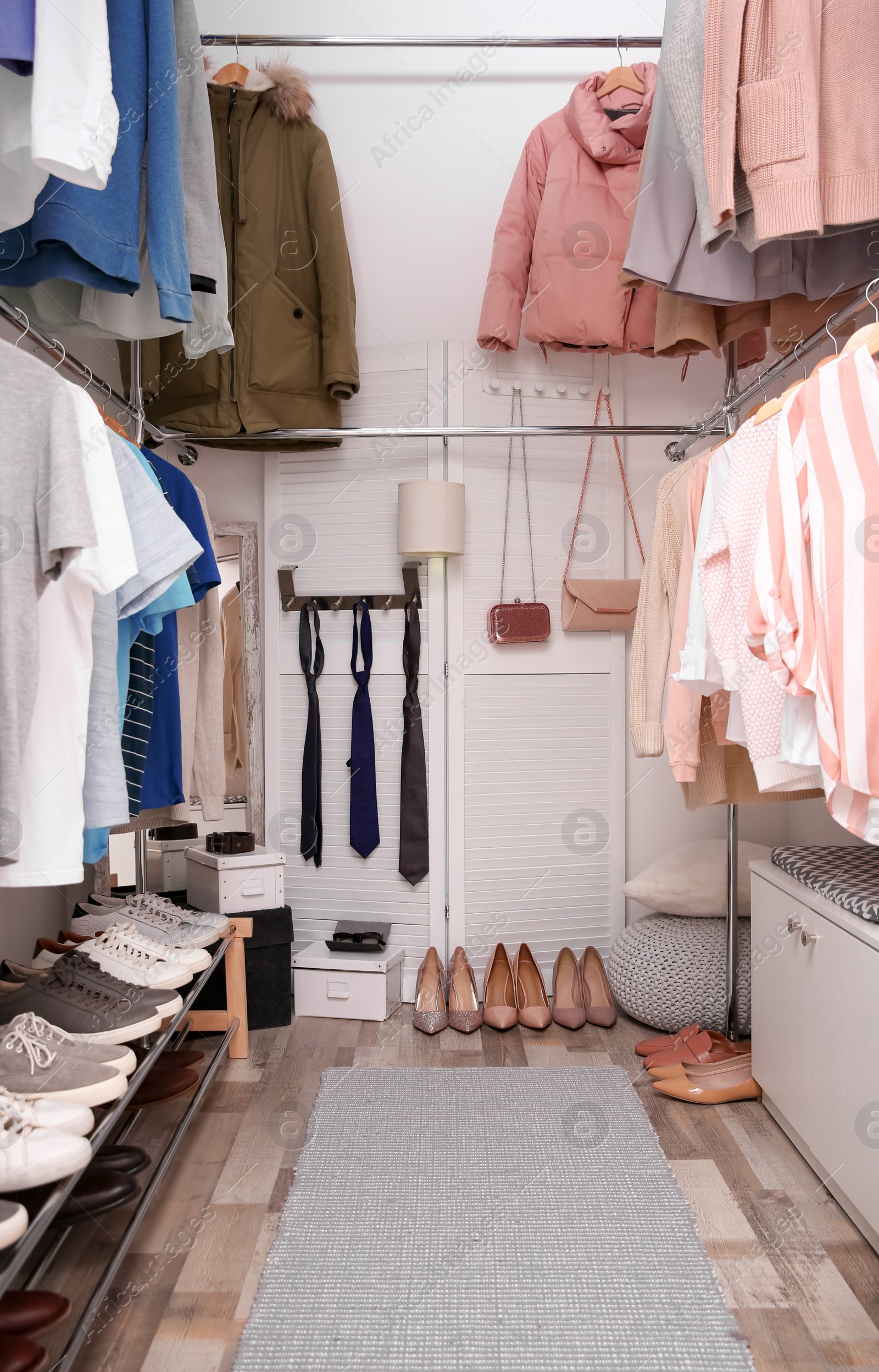 Photo of Modern dressing room with different stylish clothes and accessories