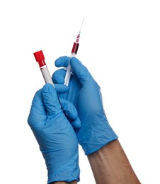 Nurse holding syringe and sample tube with blood on white background, closeup