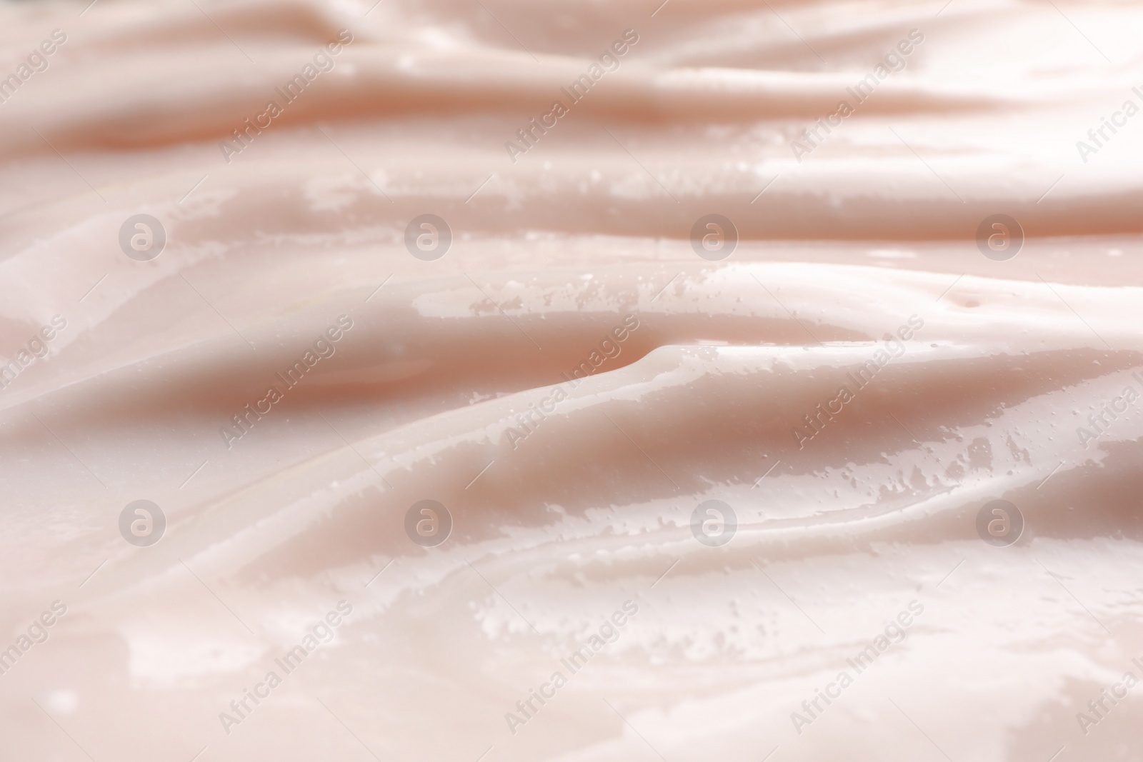 Photo of Texture of face cream as background, closeup view