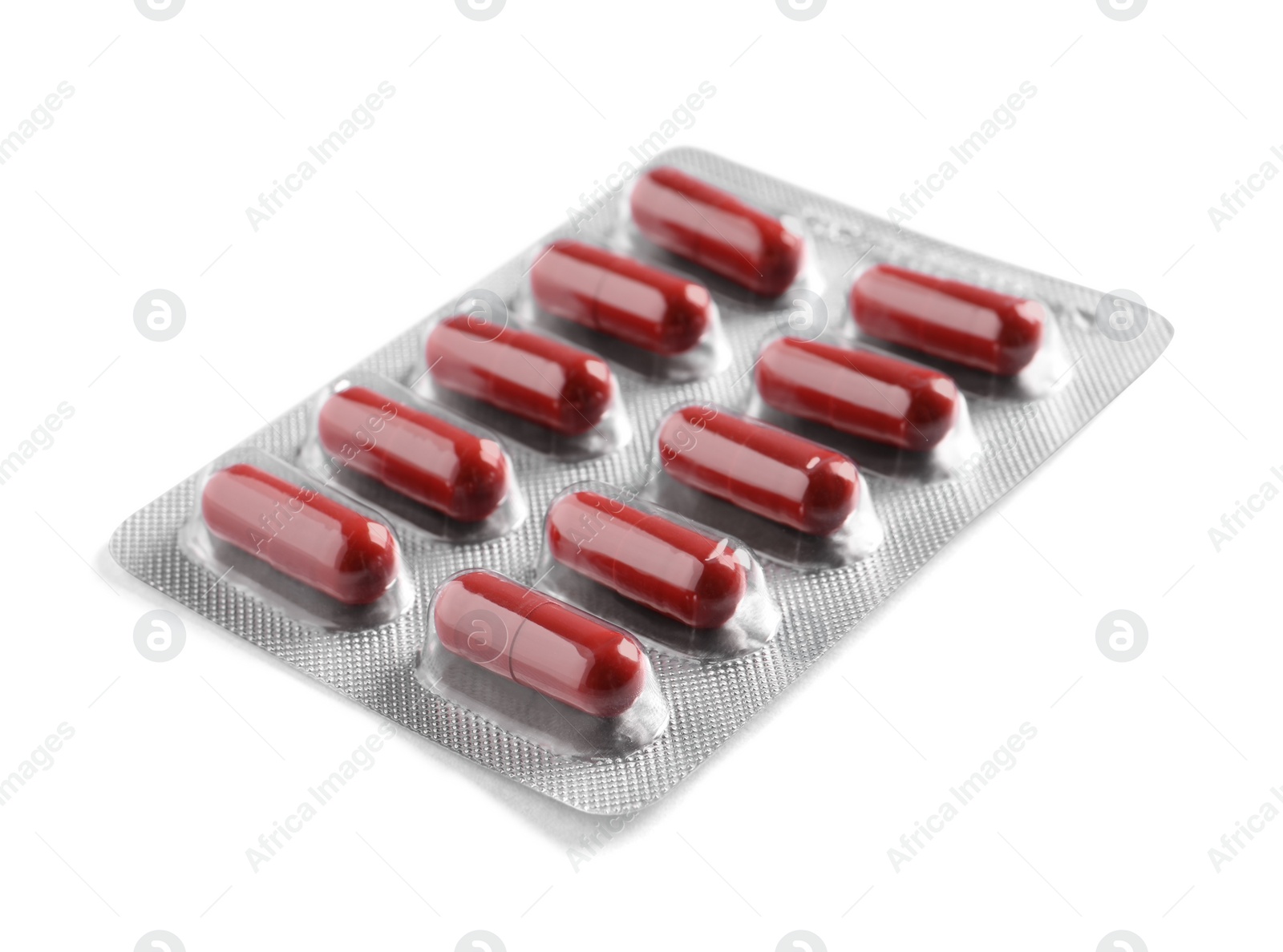 Photo of Blister of pills on white background. Medicinal treatment