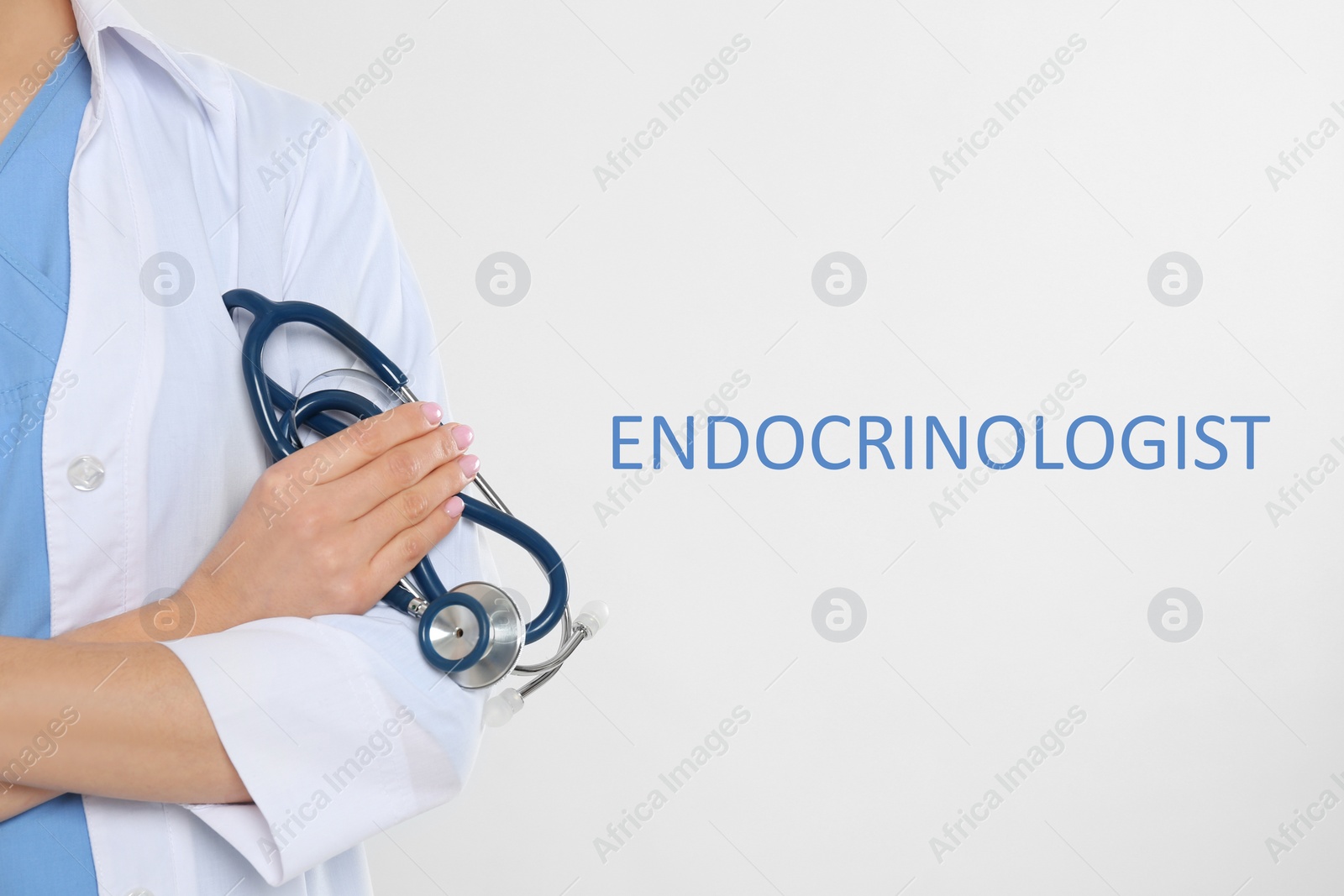 Image of Endocrinologist with stethoscope on light grey background, closeup