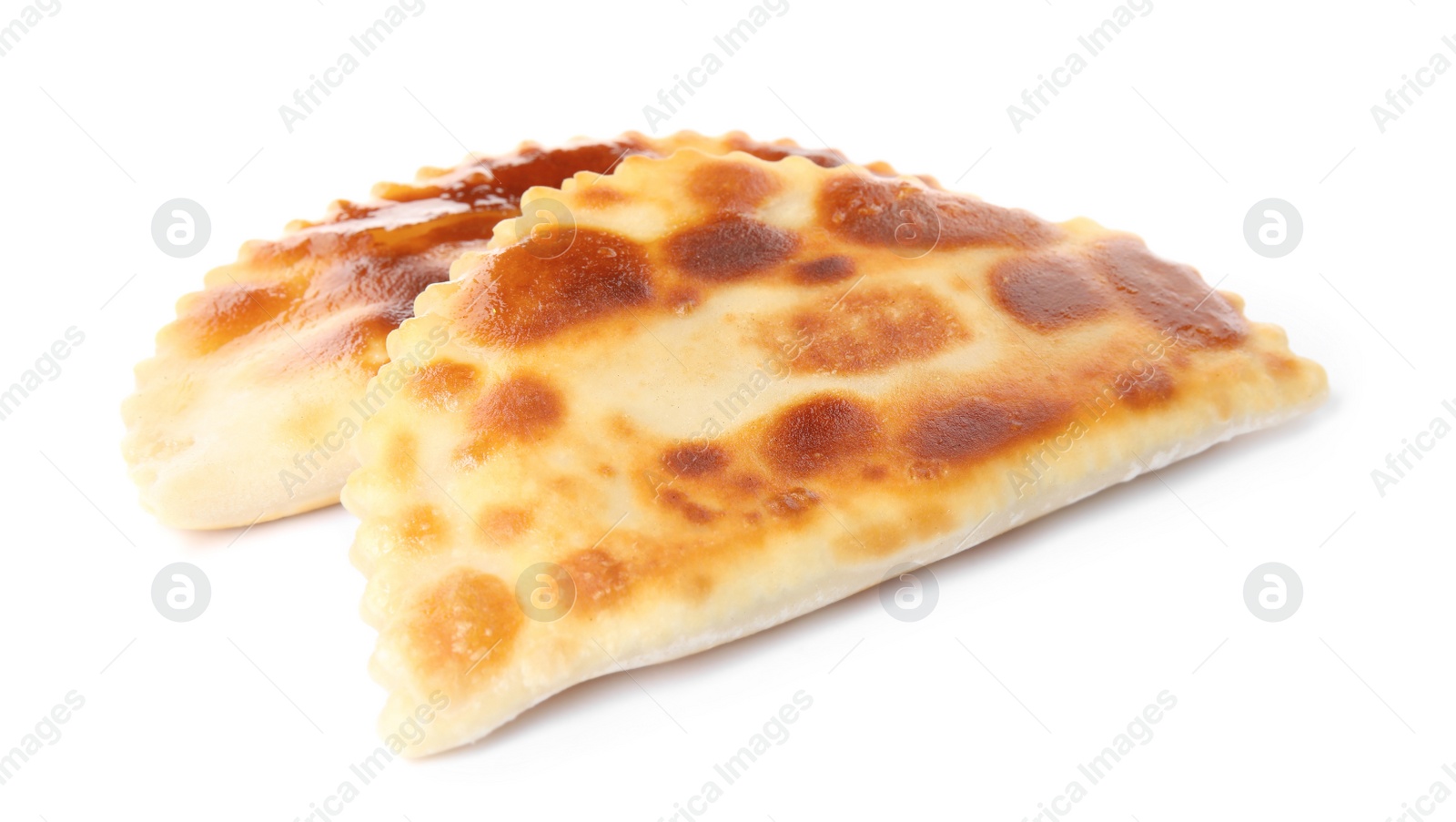 Photo of Delicious fried chebureki isolated on white. Traditional pastry