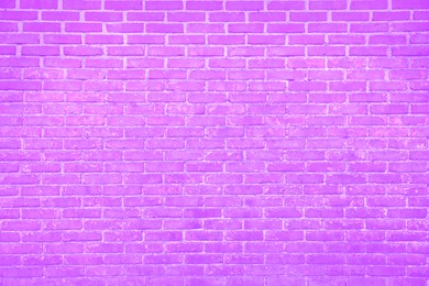 Image of Texture of bright violet brick wall as background