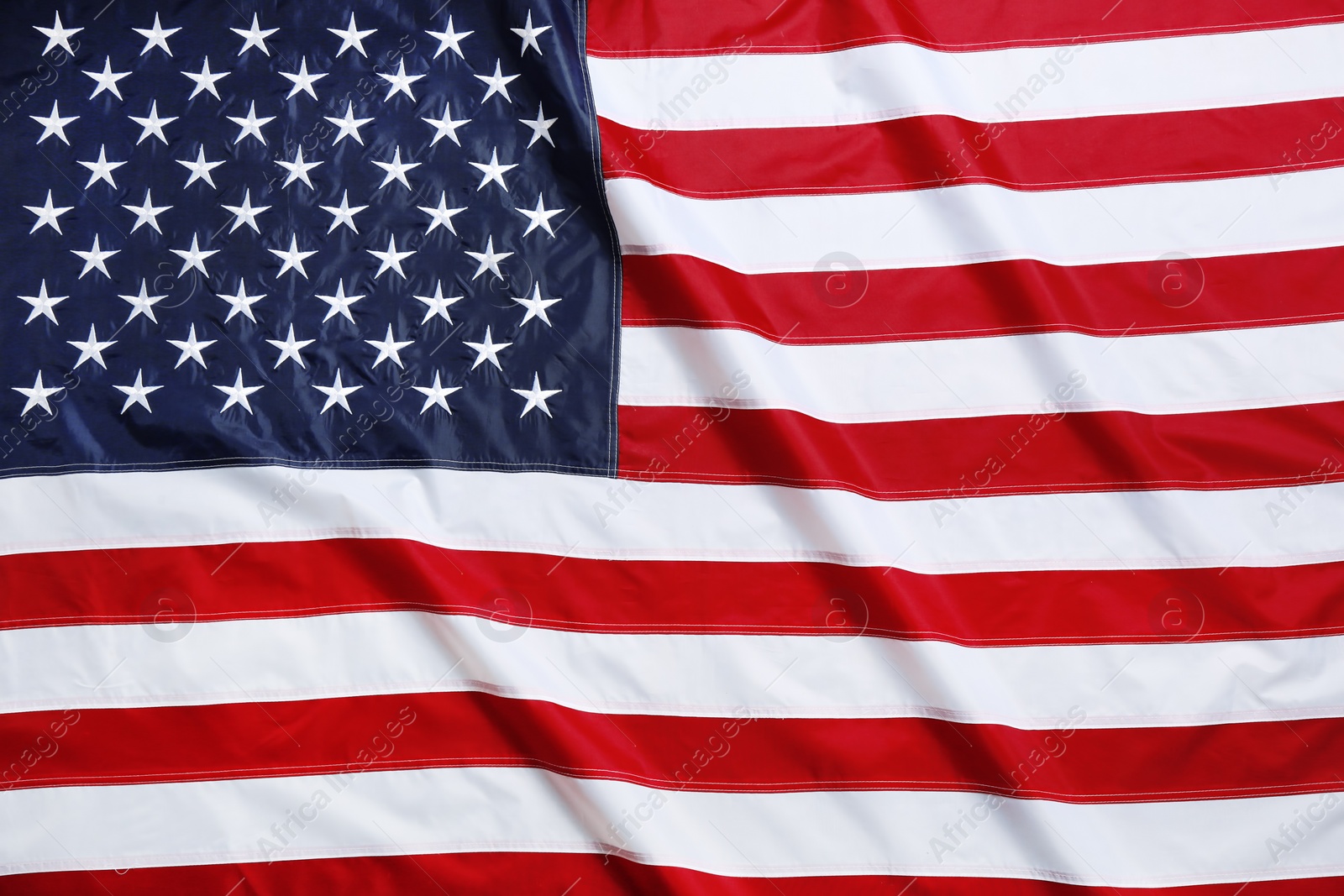 Photo of American flag as background, top view. National symbol of USA