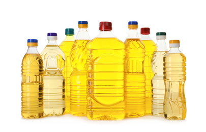 Cooking oil in different bottles isolated on white