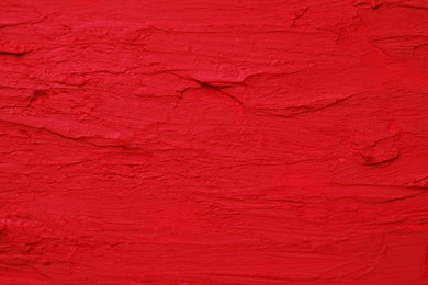 Photo of Texture of beautiful bright lipstick as background