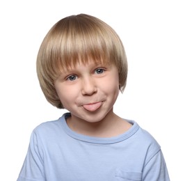 Photo of Cute little boy showing his tongue on white background