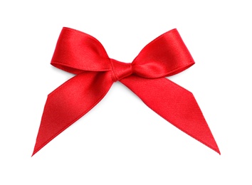 Photo of Red ribbon bow on white background, top view