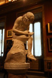 Photo of Rome, Italy - February 3, 2024: Statue of Boy with Thorn in Borghese Gallery