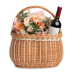 Photo of Wicker basket with different gifts on white background