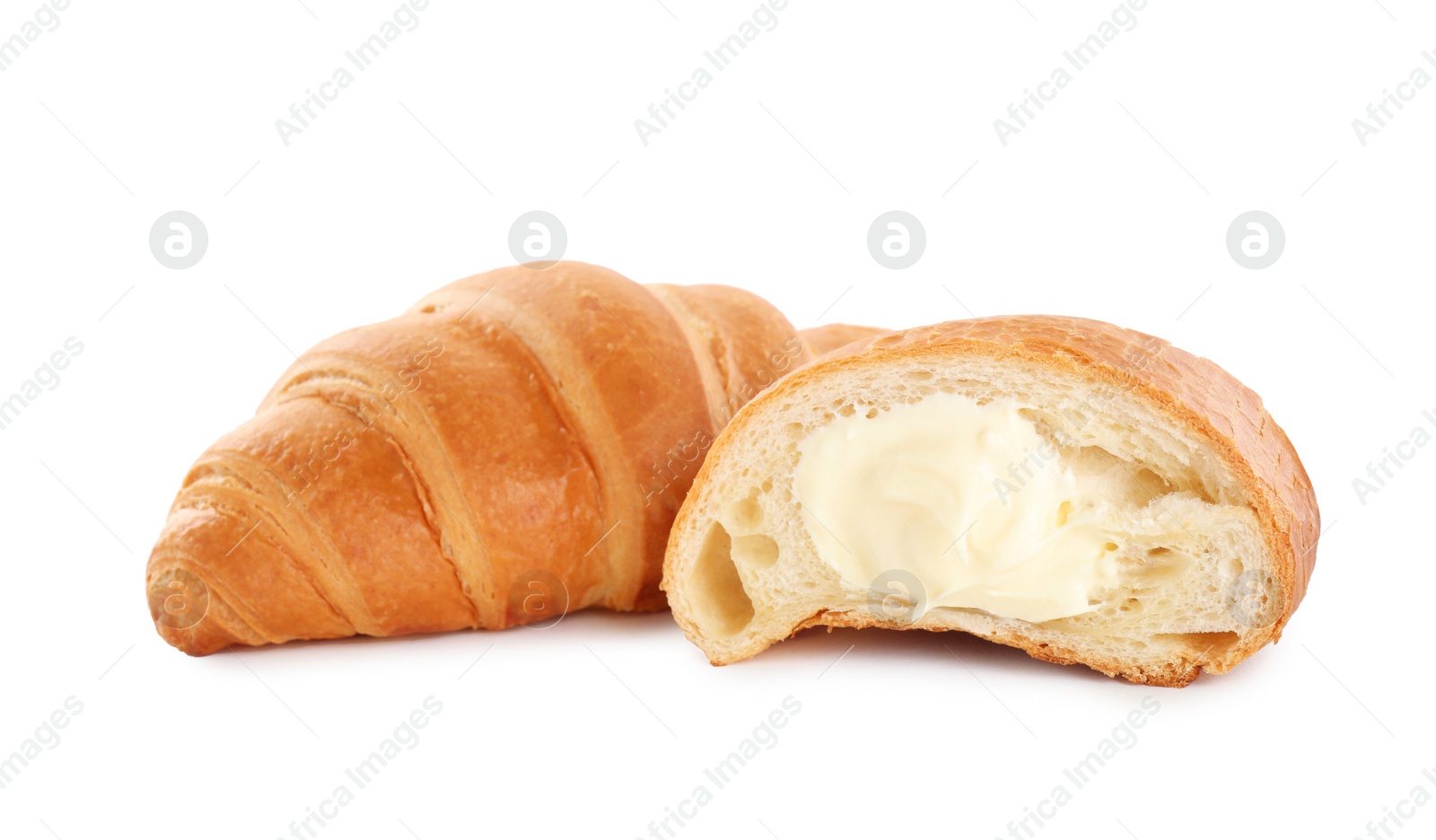 Photo of Delicious croissants with cream on white background