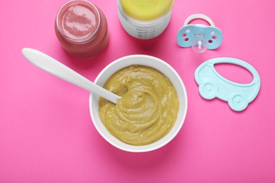 Flat lay composition with healthy baby food on pink background