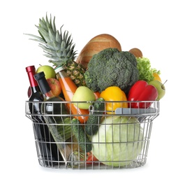 Shopping basket with grocery products on white background