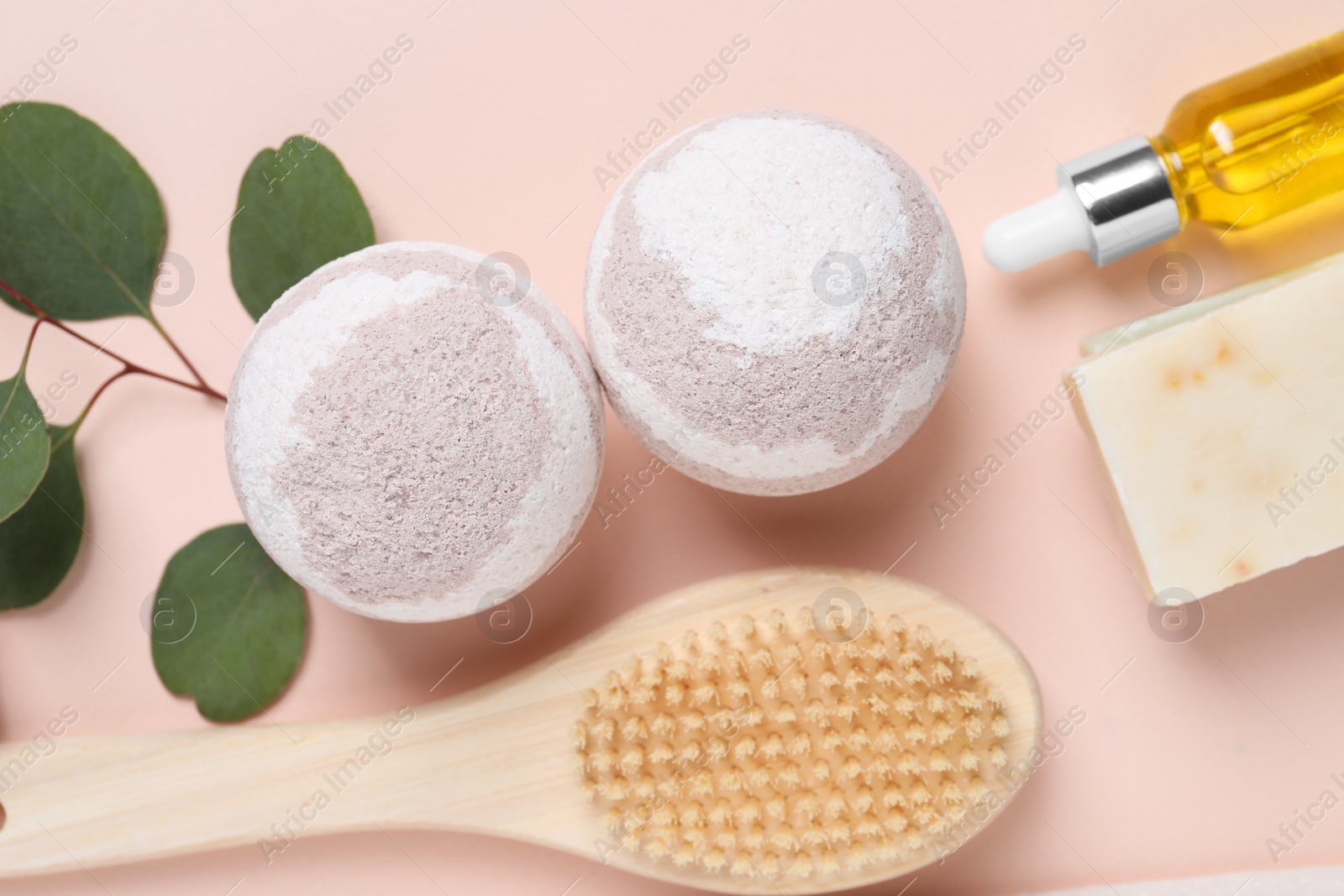 Photo of Flat lay composition with bath bombs on beige background