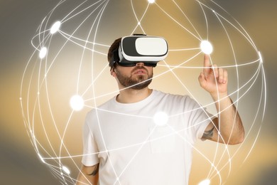 Image of Innovation idea. Man using VR headset. Sphere of connected lines around him symbolizing digital reality