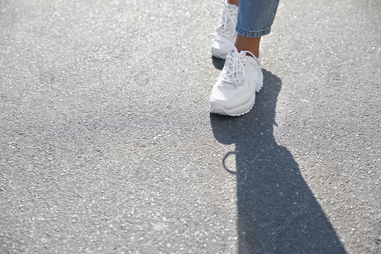 Photo of Woman walking outdoors, closeup with space for text. Choosing way concept.