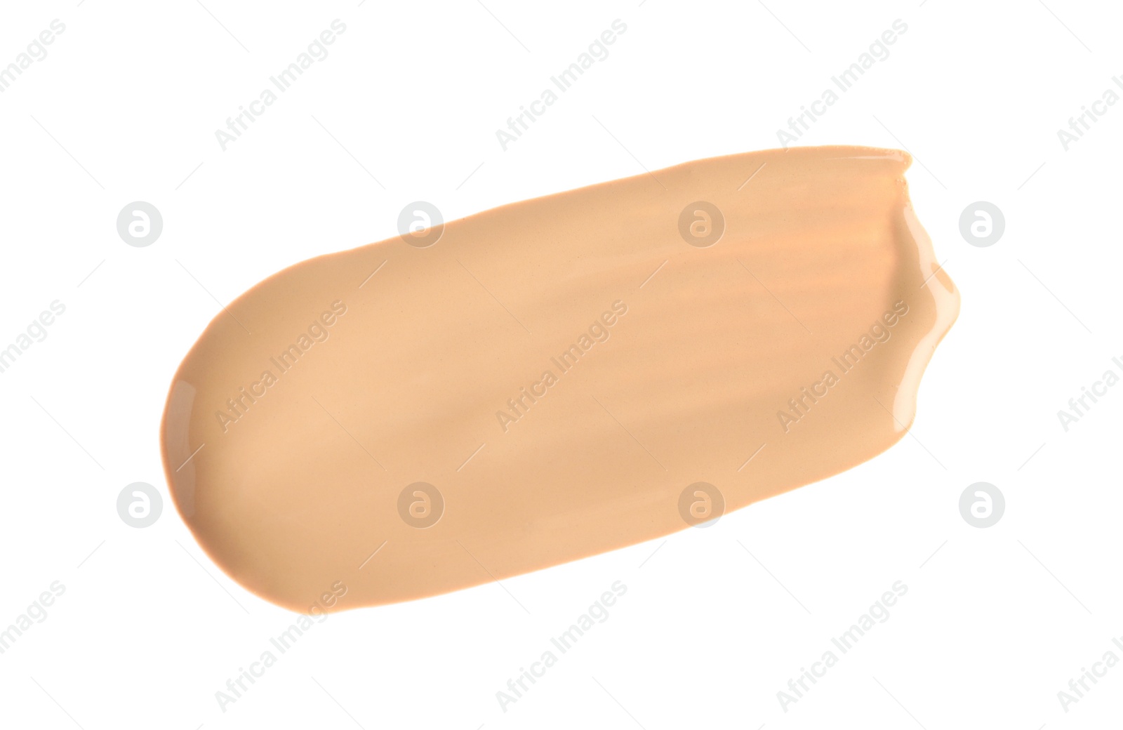 Photo of Smear of liquid skin foundation isolated on white, top view